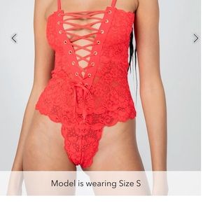 We are HAH reversible Small bodysuit in red